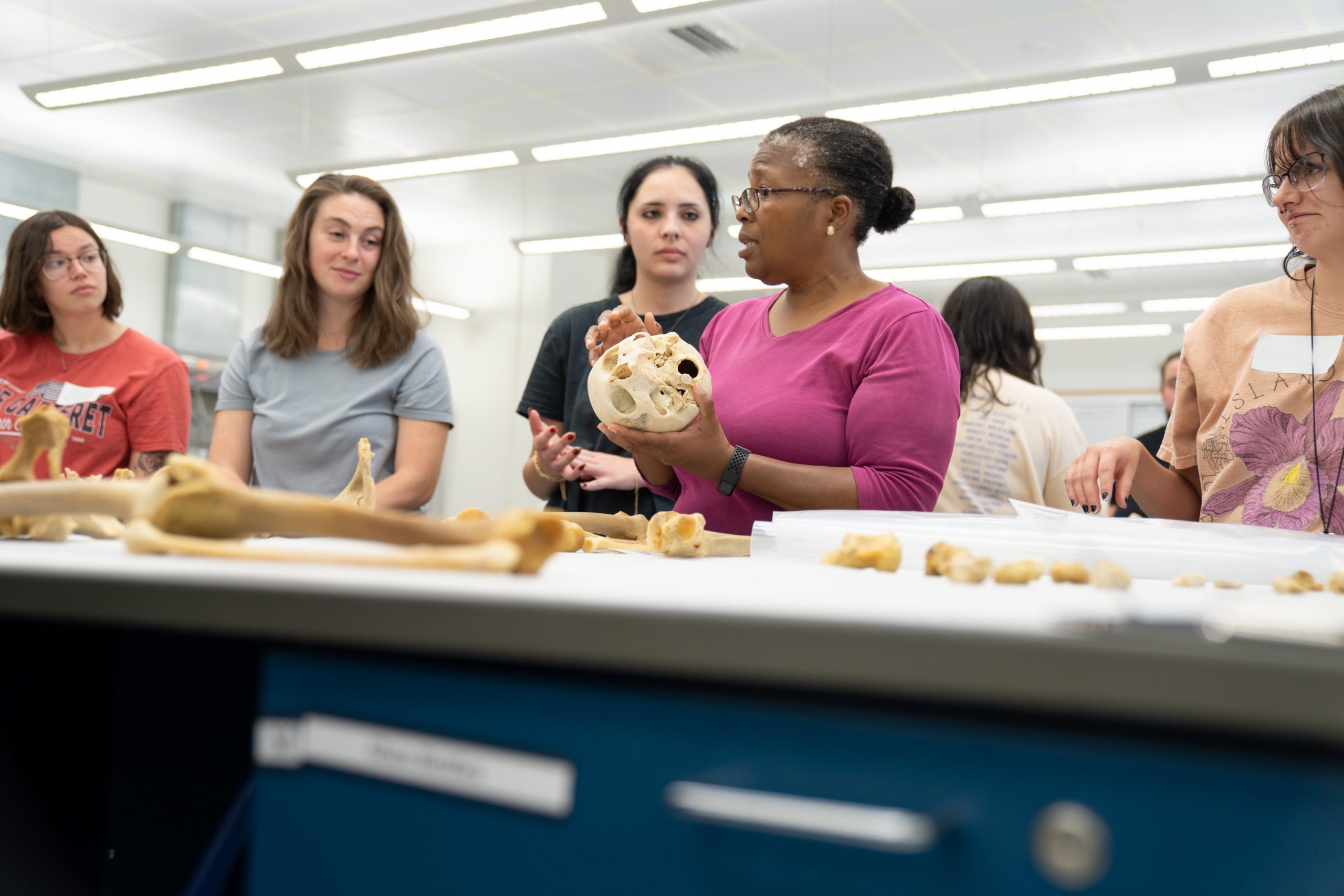 Dr. Phoebe Stubblefield teaching students from the Gainesville Anthropology Field School. 