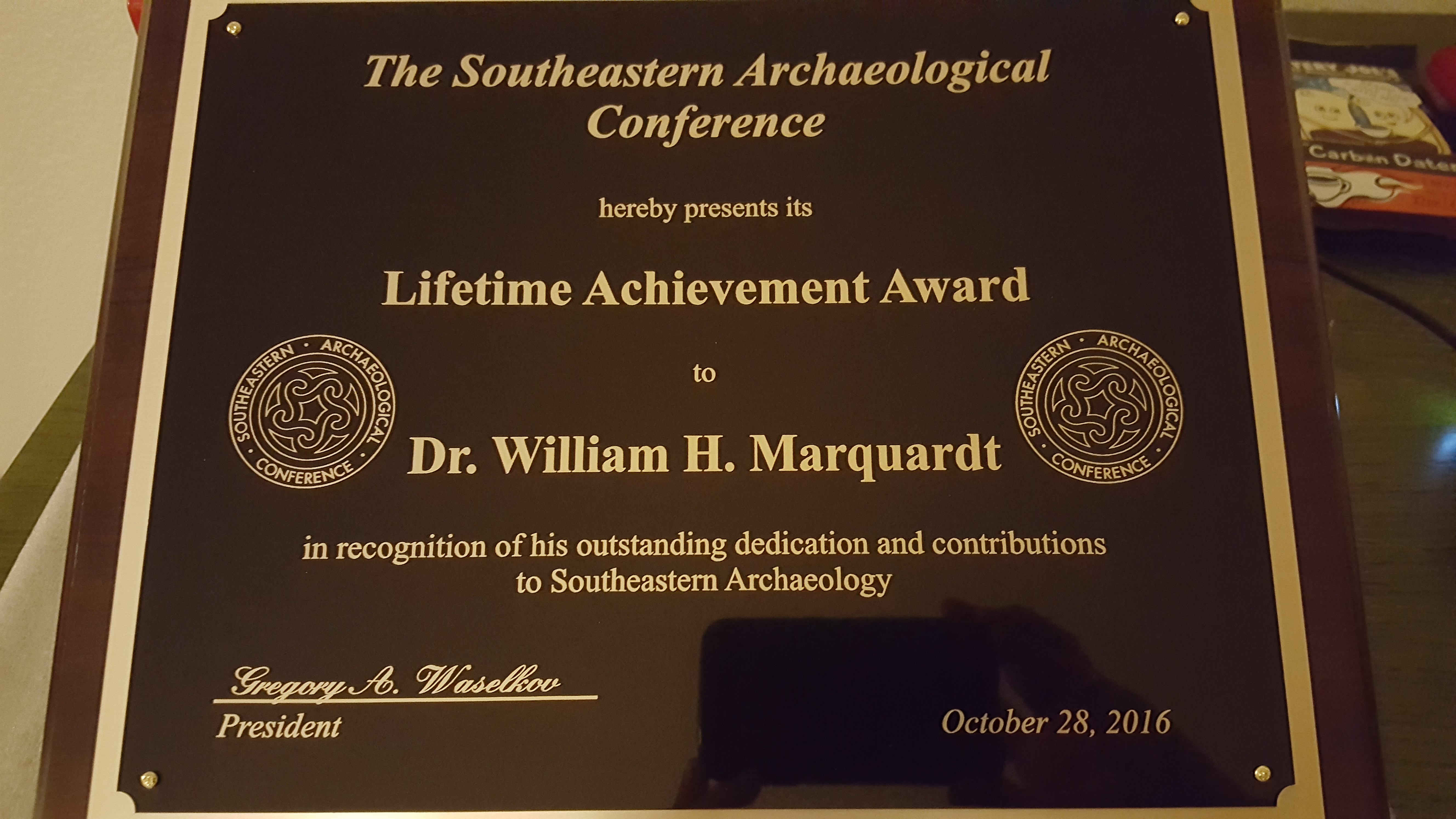 Photo of diploma plaque given to Dr. William H. Marquardt.